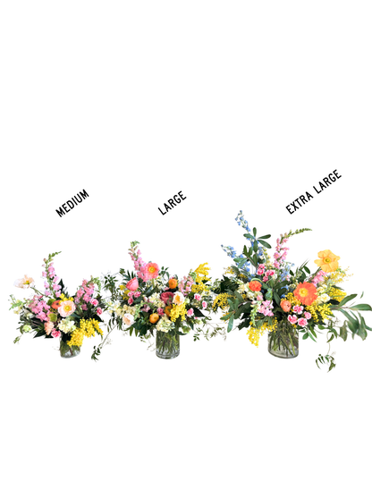 Fresh Flower Arrangement · Clear Glass Vase