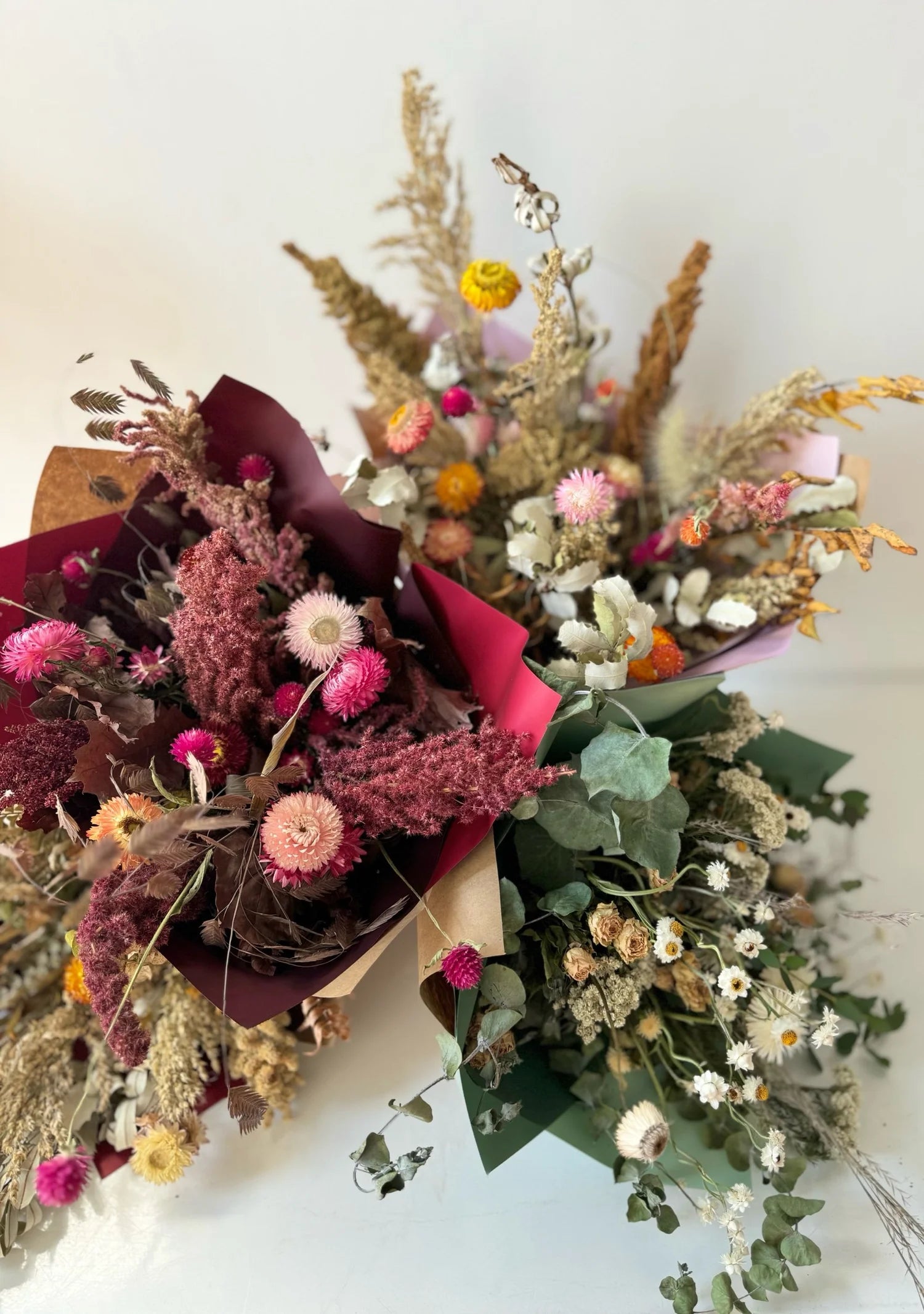 Bouquet of dried flowers with a mix of colors on a white background