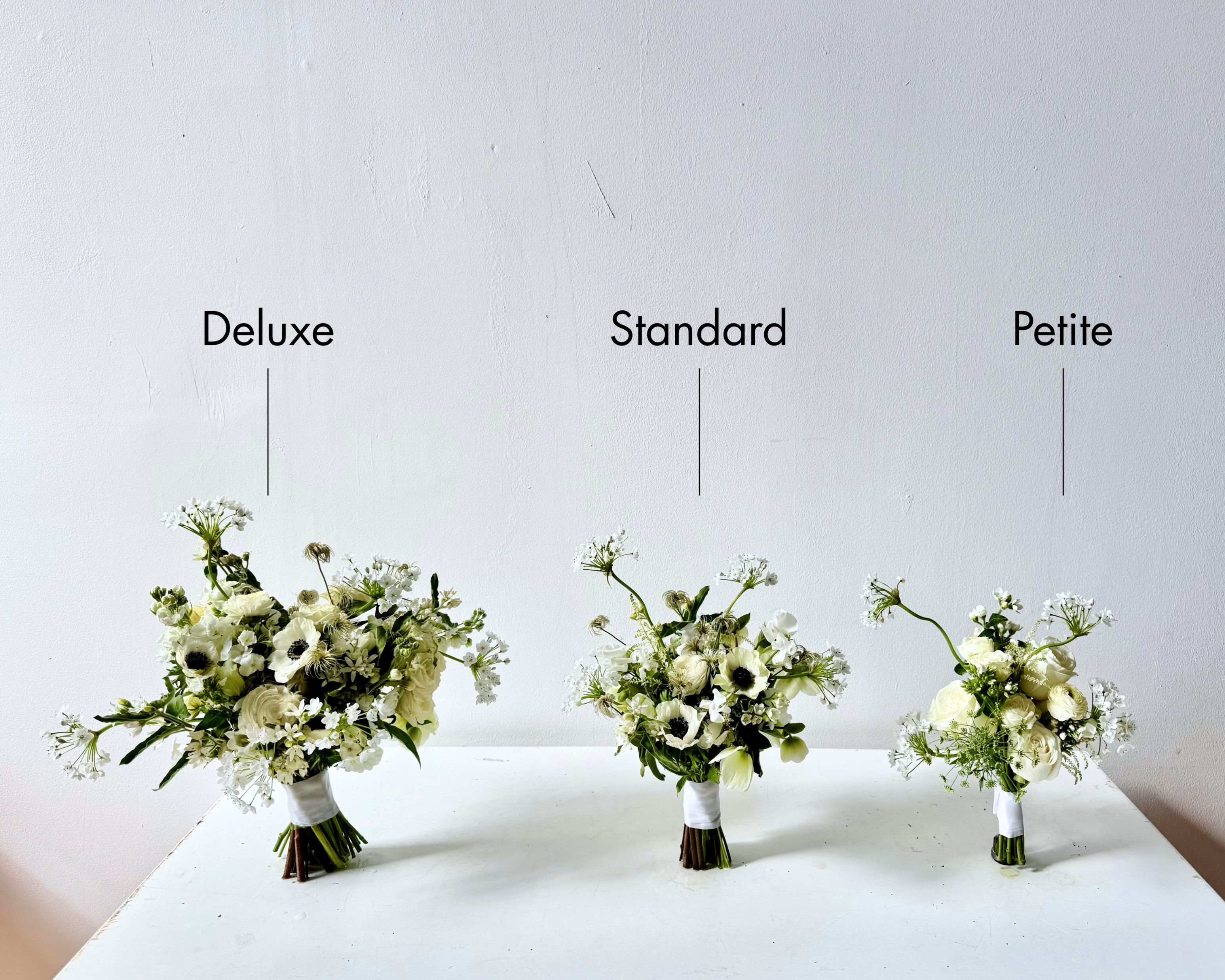 Bridal party bouquets in three sizes available for delivery in Maine.