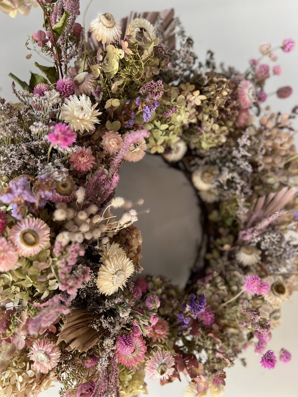 Dried flower wreath with a neutral background